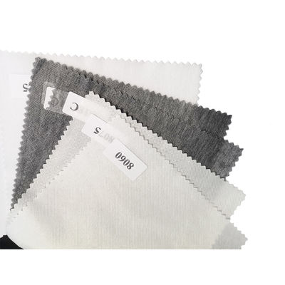 Ενσωματωμένα ενσωματωμένα 16-100gm Polyester Double Dot Non Woven Thin Fusible Interlining